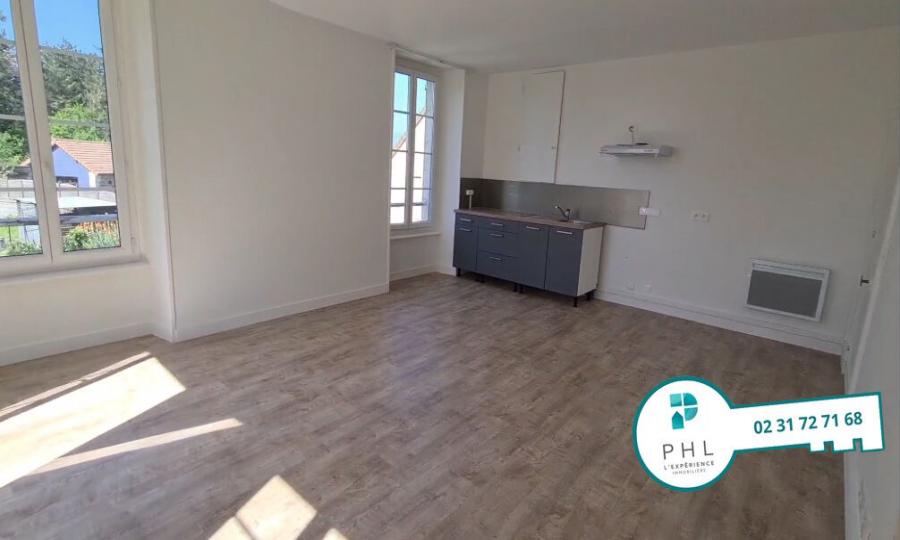 A FEUGUEROLLES-BULLY APPARTEMENT 3 PIECES AVEC JARDIN COMMUN ET STATIONNEMENT DANS COUR COMMUNE