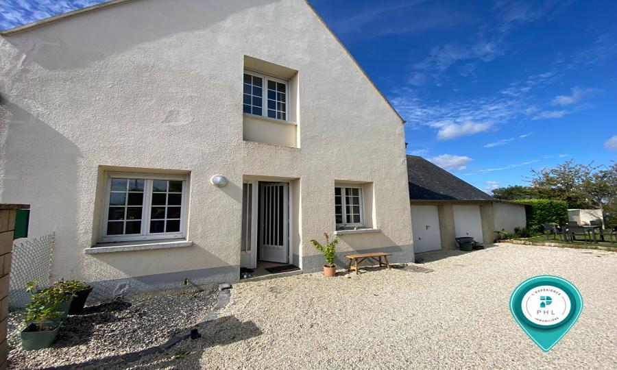 A BARON-SUR-ODON MAISON DE 115 M² HABITABLE AVEC DOUBLE-GARAGE SUR UN TERRAIN CLOS ET ARBORE DE 329 M²