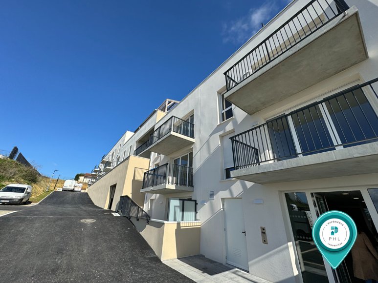 Carpiquet | Appartement neuf 3 pièces de 60 m² avec balcon et 2 places de parking privatives - PHL Immobilier